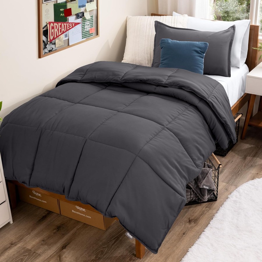 Neutral comforter styled on a dorm bed